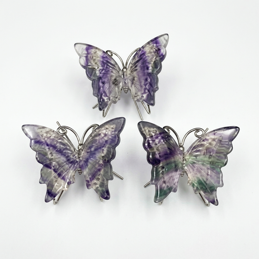 Natural Rainbow Fluorite Butterfly Carvings on pure white background